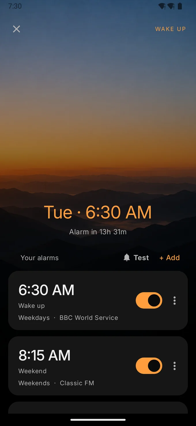 The Wake up screen, listing alarms above a reliability check.